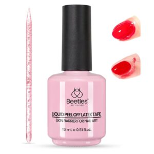 A light pink Beetles Liquid Peel Off Latex Tape bottle with a black cap, labeled “Skin Barrier for Nail Art, 15 mL.” To the left is a slim pink applicator stick with a pointed tip. On the right, two close‑up nail photos show the product in use—one with bright red polish and a pink latex barrier around the nail, and another with the barrier being peeled off to reveal clean edges. The layout highlights the product’s purpose as a peel‑off cuticle guard for nail art protection.
