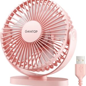 Light pink Gaiatop USB desk fan with circular grille and three blades, mounted on a flat oval base. The fan features a side power button and comes with a matching pink USB‑A cable for portable power. Compact and modern design ideal for desktop or travel use.