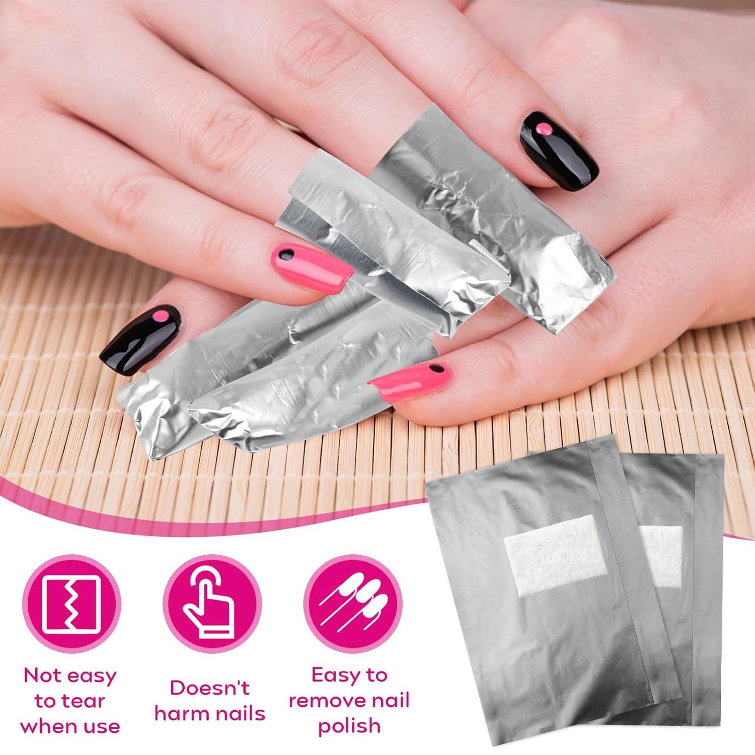 A close-up of hands with pink and black nail polish, each nail featuring a small contrasting dot near the cuticle. Several fingers are wrapped in shiny silver foil nail remover wraps. Below the hands, three icons highlight product benefits: “Not easy to tear when use,” “Doesn’t harm nails,” and “Easy to remove nail polish.” Two foil wraps with white absorbent pads are shown beside the icons, illustrating the product’s design and purpose.
