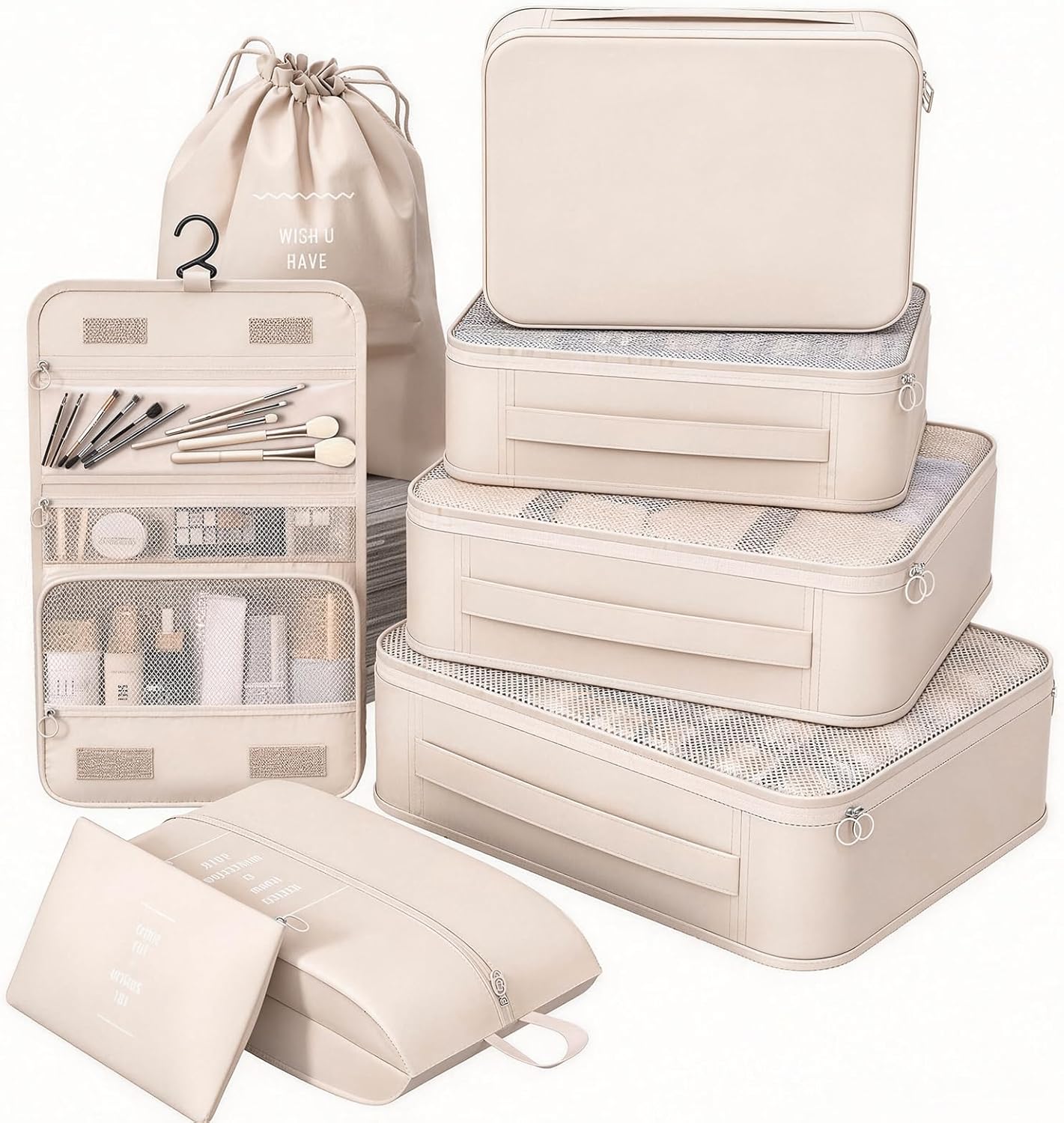 A coordinated set of eight cream‑colored travel packing cubes and organizers displayed neatly on a white background. The collection includes four rectangular zippered cubes with mesh tops, a drawstring laundry bag, a hanging toiletry organizer with compartments holding brushes and bottles, a flat pouch, and a pillow‑shaped zip bag. Each piece features minimalist text such as “WISH U HAVE” and “WISH U HAVE A COLORFUL LIFE ANYWHERE YOU GO,” highlighting its stylish, modern design for organized travel.